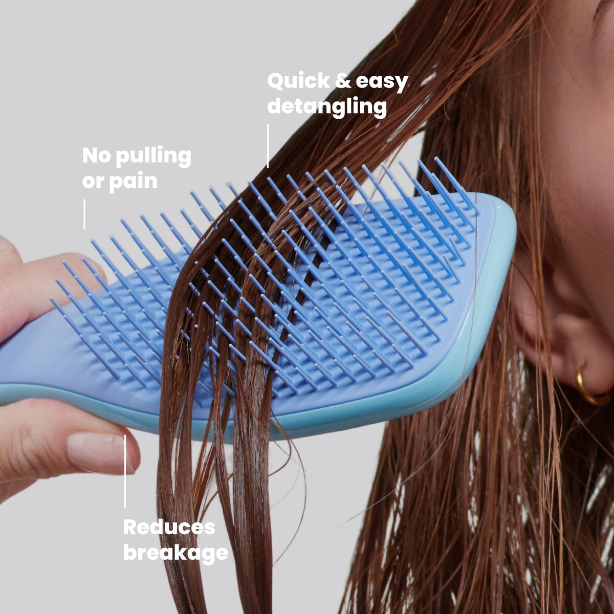 TANGLE TEEZER Ultimate Detangler Brush in lifestyle setting on bathroom counter