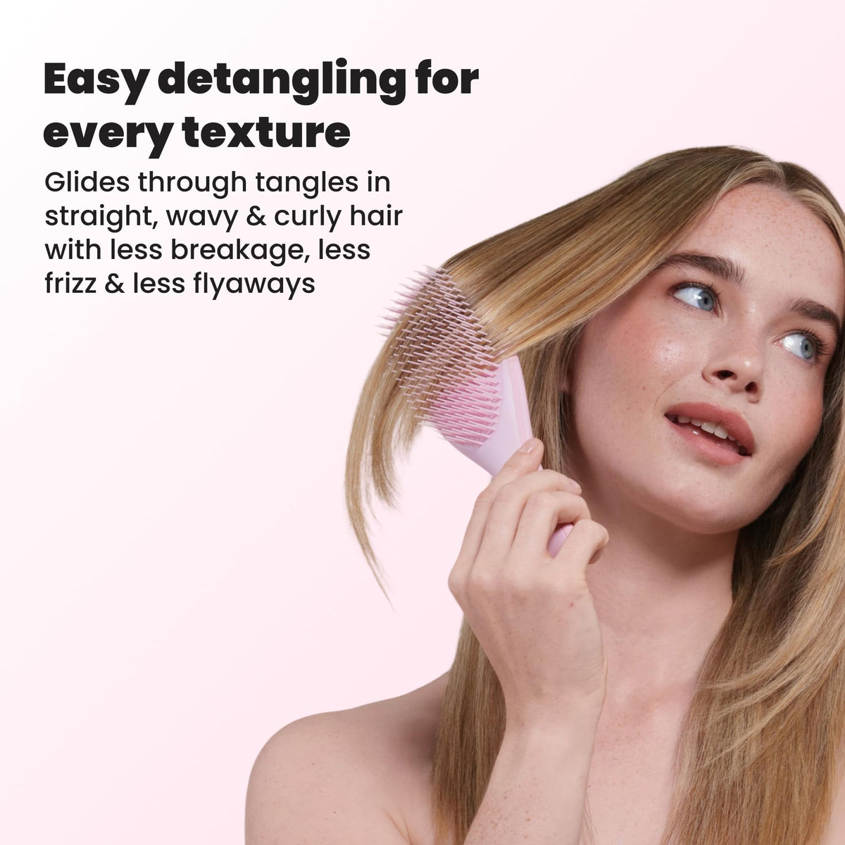 TANGLE TEEZER Ultimate Detangler Brush in use on wavy hair