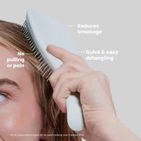TANGLE TEEZER Ultimate Detangler Brush in use on wet hair