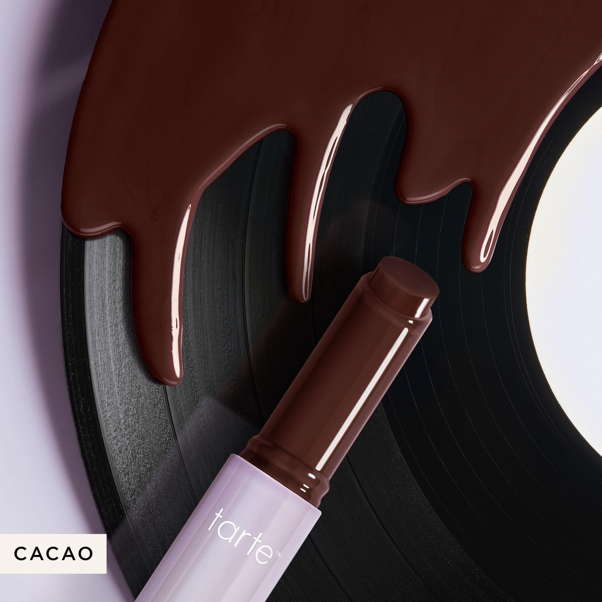 tarte Maracuja Juicy Lip Vinyl Gloss Cacao with other makeup