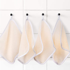 Tatuo Exfoliating Wash Cloths hanging to dry