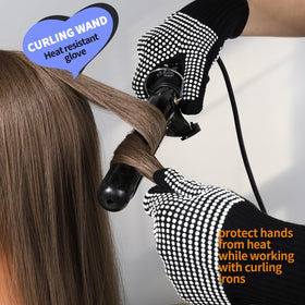 Teenitor heat resistant gloves on a table with hair styling tools