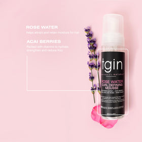 Thank God It's Natural Rose Water Curl Defining Mousse on a bathroom shelf
