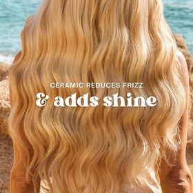 The Beachwaver Co. B1 curling iron side view showing swivel cord