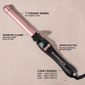 The Beachwaver Co. B1 curling iron with ceramic barrel and buttons
