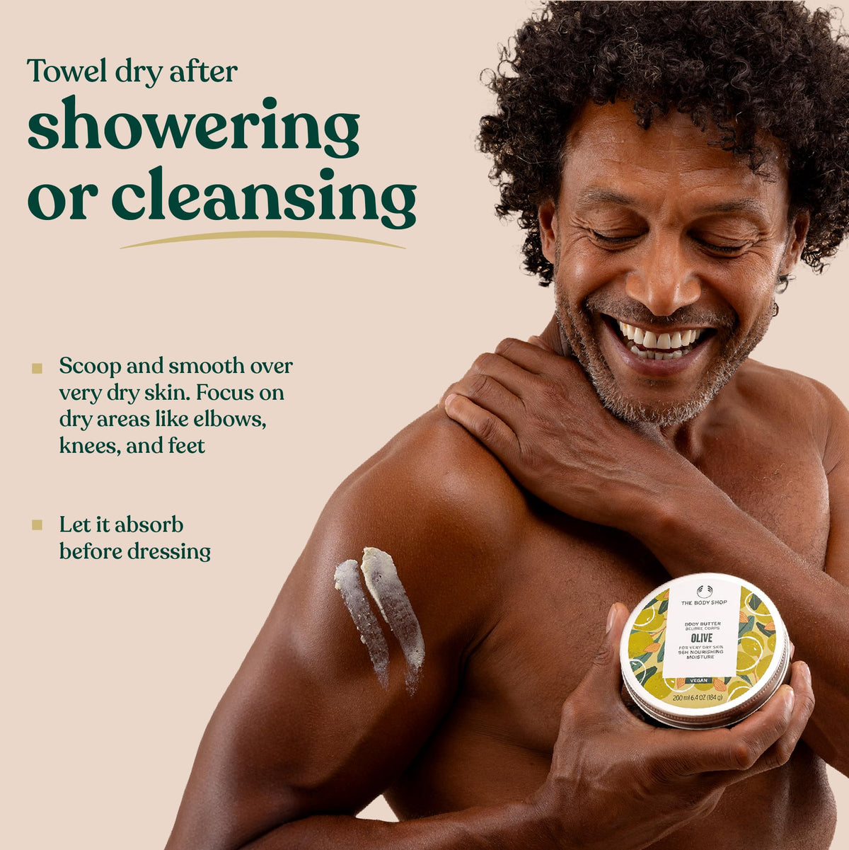 The Body Shop Olive Body Butter 240g displayed with other skincare products