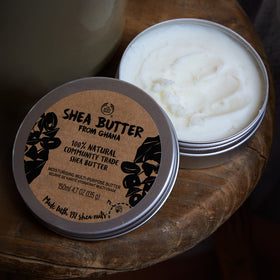 The Body Shop Shea Butter on a wooden surface