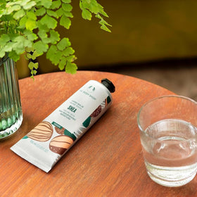 The Body Shop Shea Hand Balm application on hands