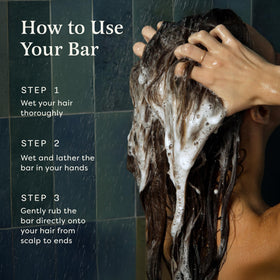 The Earthling Co. Shampoo & Conditioner Bars on a bathroom shelf
