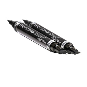 The Flick Stick Eyeliner Stamp with a swatch of Midnight Black on skin