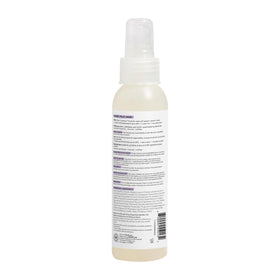The Honest Company Hair Detangler Lavender Calm 4 fl oz on a vanity
