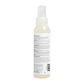The Honest Company Hair Detangler on a bathroom shelf