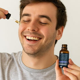 The Ilex Wood Frankincense and Bergamot Facial Serum 20ml on a wooden surface
