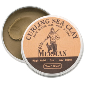 The Merman Curling Sea Clay 2 oz front view with packaging