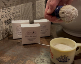 The Village Soapsmith Shaving Soap side view showing packaging