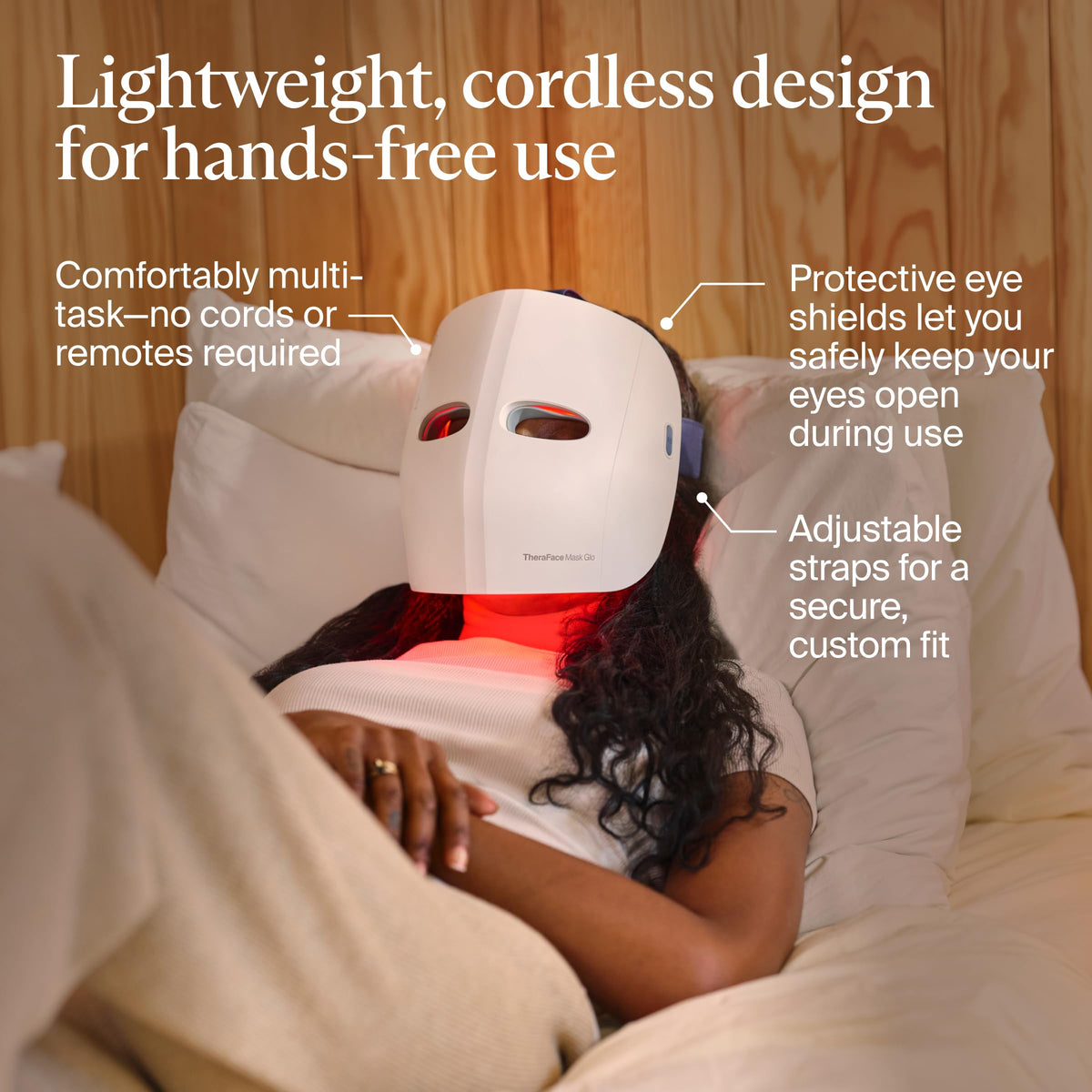 TheraFace Glo LED face mask displaying Red, Blue, and Infrared light options