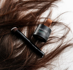 Thick Fiber Root Touch Up Powder Medium Brown in use outdoors