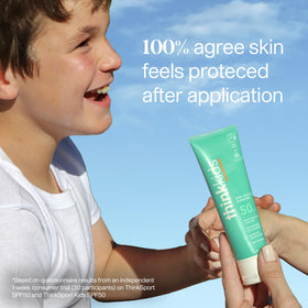 THINK Kids Sunscreen SPF 50+ packaging on a sunny day outdoors