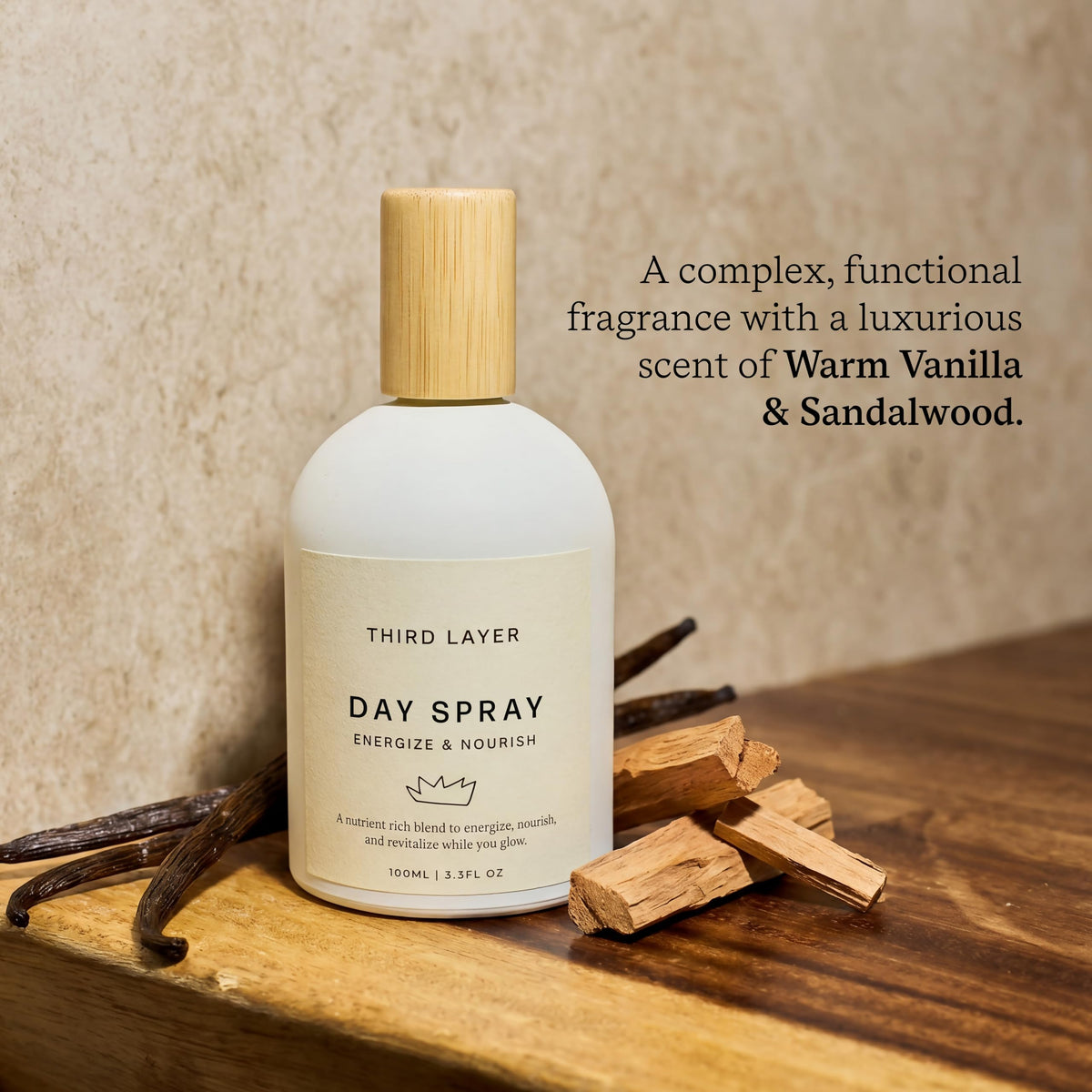 Third Layer Day Spray Body Oil bottle with warm vanilla and sandalwood scent