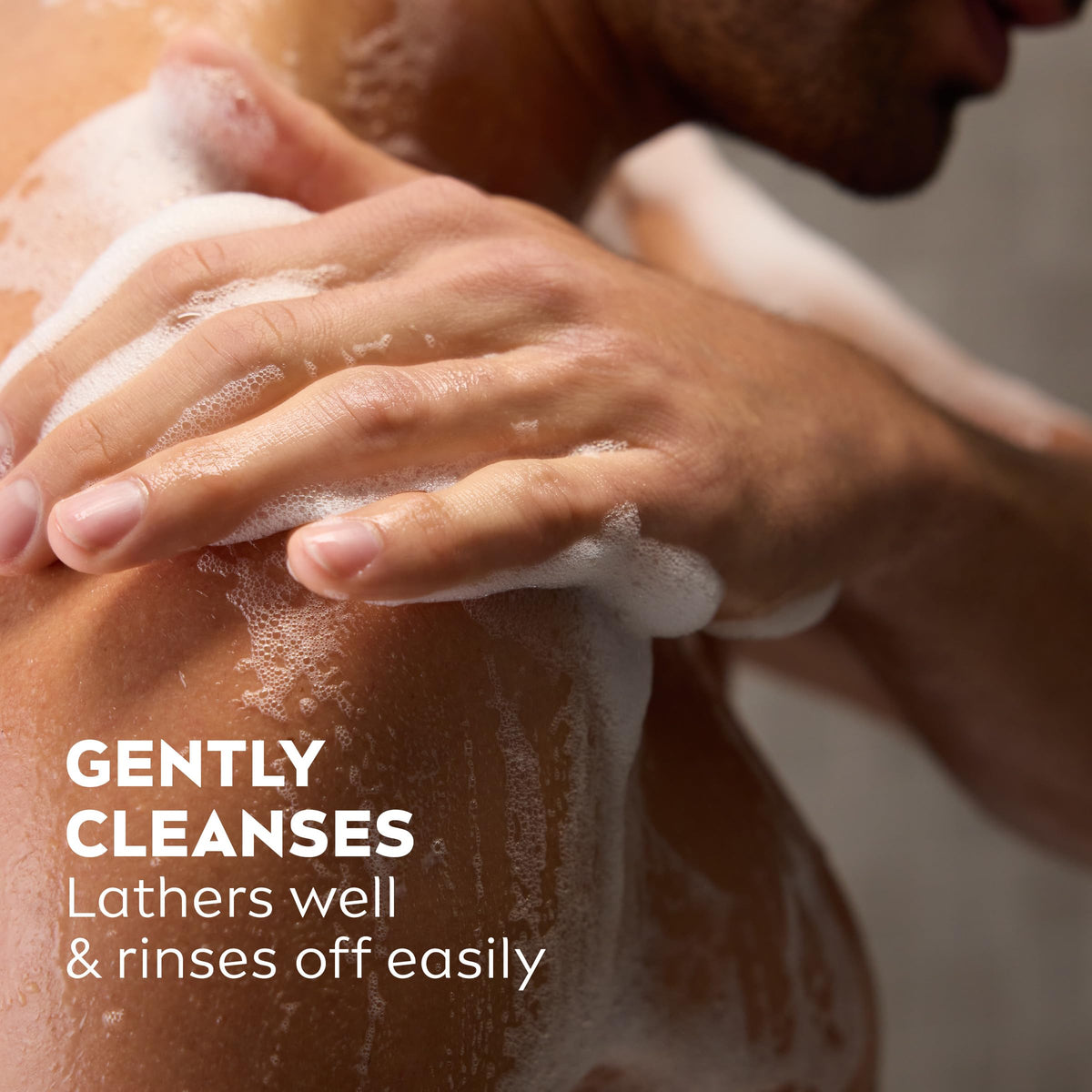 Three NIVEA MEN Sensitive Body Wash bottles stacked