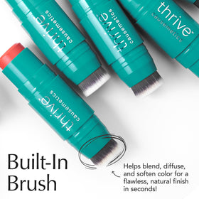 Thrive Causemetics Cream Blush Stick Brick Red Shimmer applied on cheeks