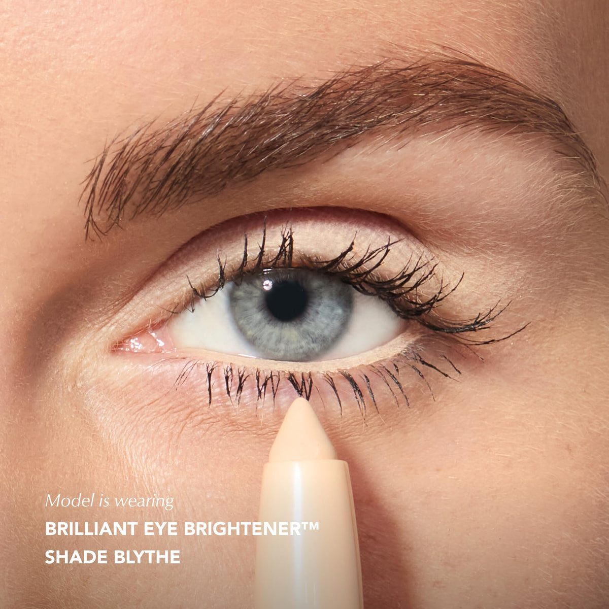Thrive Causemetics Eye Brightener Stick in use for highlighting