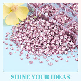 TINKRSTUFF rhinestones applied to a nail art design