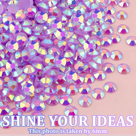 TINKRSTUFF rhinestones on a decorated phone case