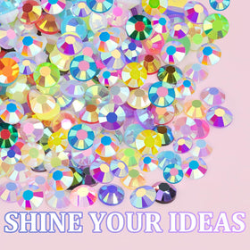 TINKRSTUFF rhinestones with tools and glue on a table