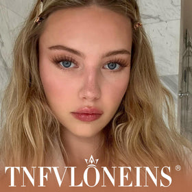 TNFVLONEINS Brown Lash Clusters displayed on a makeup table