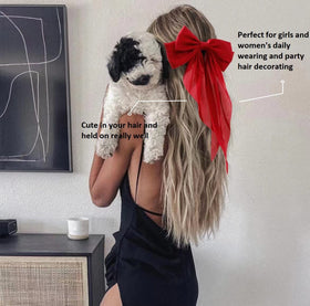 Tobeffect hair bows styled in a half-up hairstyle