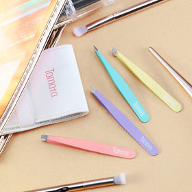 Tomata tweezers set on a bathroom counter