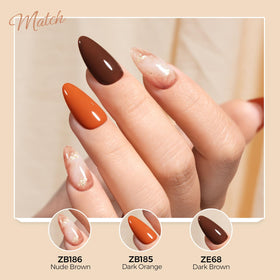 TOMICCA Dark Brown Gel Nail Polish on display with autumn leaves