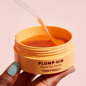 TONYMOLY Plump-kin Pumpkin Under Eye Patch in use with model