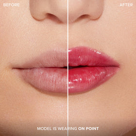 Too Faced Lip Injection Extreme Plumping Clicks Cherry Red in lifestyle setting