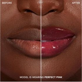 Too Faced Lip Injection Extreme Plumping Clicks in hand with natural lighting