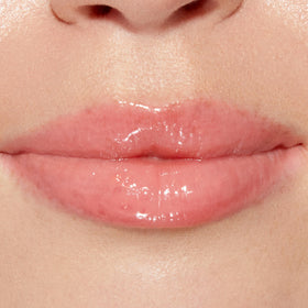 Too Faced Lip Injection Lip Gloss with strawberries background