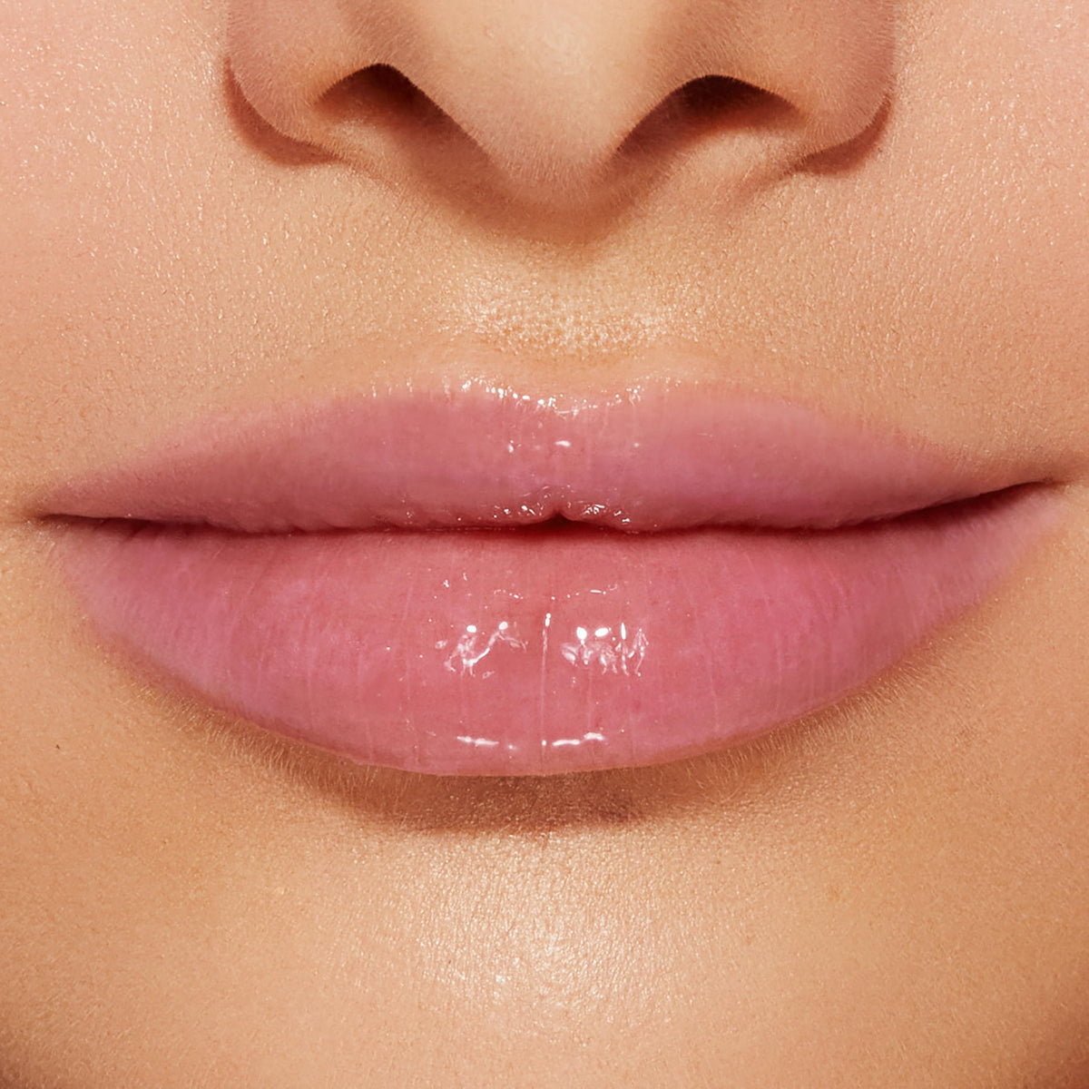 Too Faced Lip Injection Lip Gloss with strawberries background