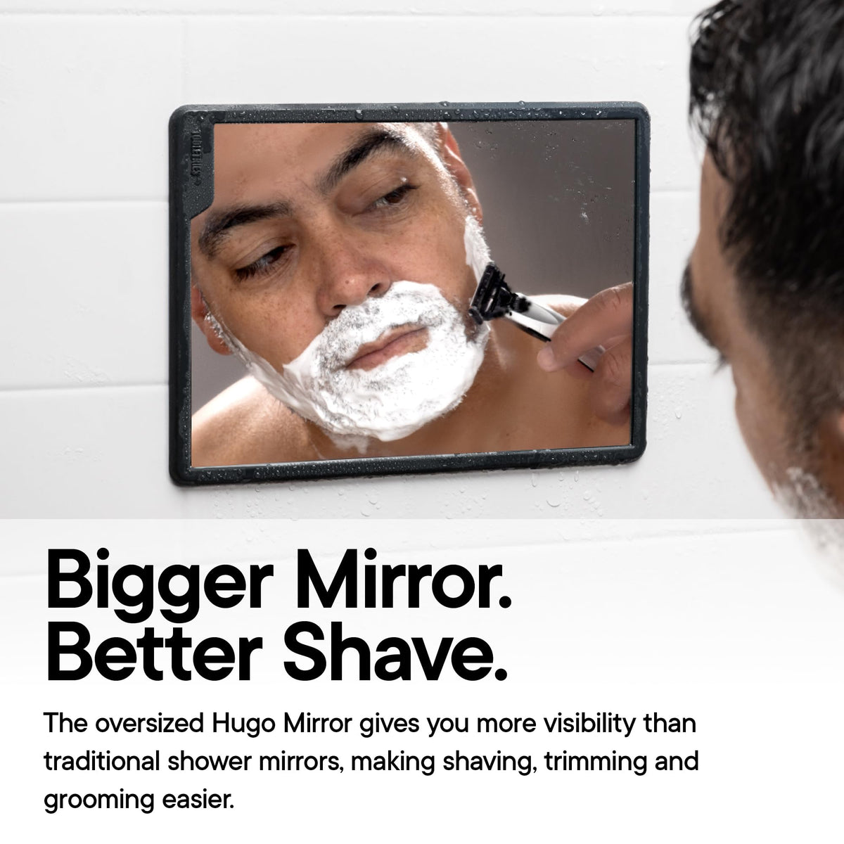 TOOLETRIES Hugo Maxi Shower Mirror mounted on a glossy tile