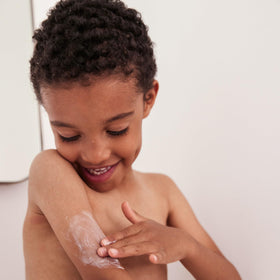 Topicrem Atopic Skin AD Emollient Balm applied on skin