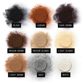 TOPPIK Hair Building Fibers on styling table