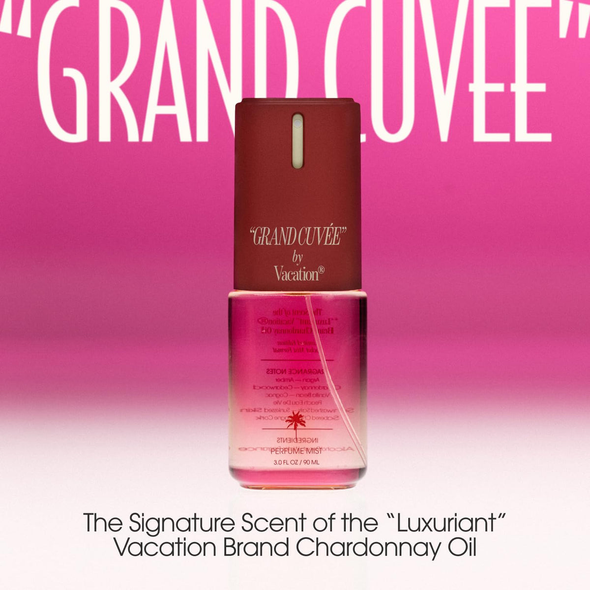 Travel-sized VACATION Body Mist set displayed on a beach
