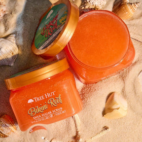 Tree Hut Bikini Reef Body Scrub 18 Oz in a bathroom setting