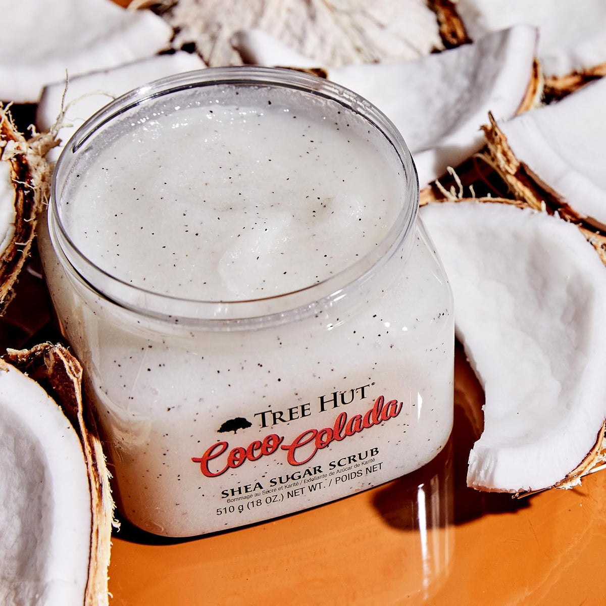 Tree Hut Coco Colada Body Scrub 18 Oz in a bathroom setting