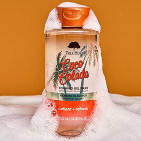 Tree Hut Coco Colada Foaming Body Wash with bath accessories