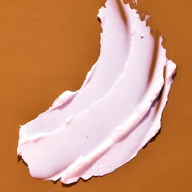 Tree Hut Coco Colada Whipped Body Butter on a bathroom counter