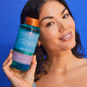 Tree Hut Lotus Water Foaming Body Wash packaging on a bathroom shelf