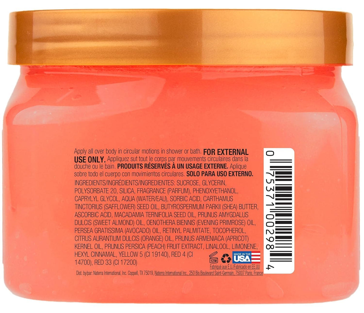 Tree Hut Peach Sorbet Body Scrub in use on skin