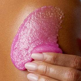 Tree Hut Raspberry Fizz Body Scrub 18 Oz in a bathroom setting