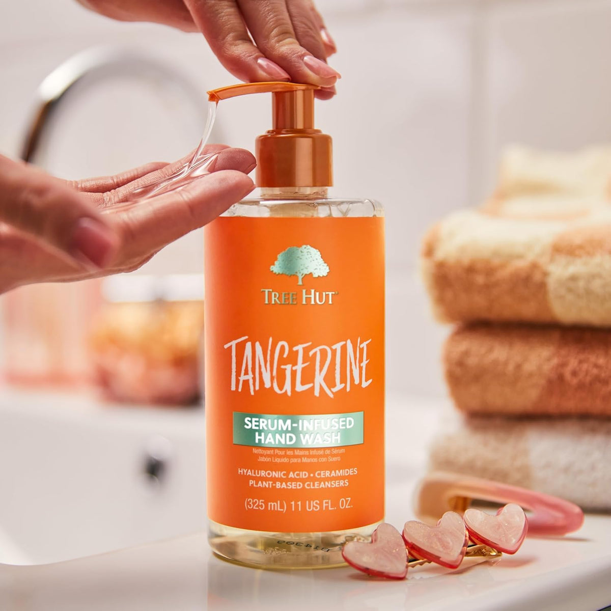 Tree Hut Tangerine Serum Infused Hand Wash back view with ingredient list